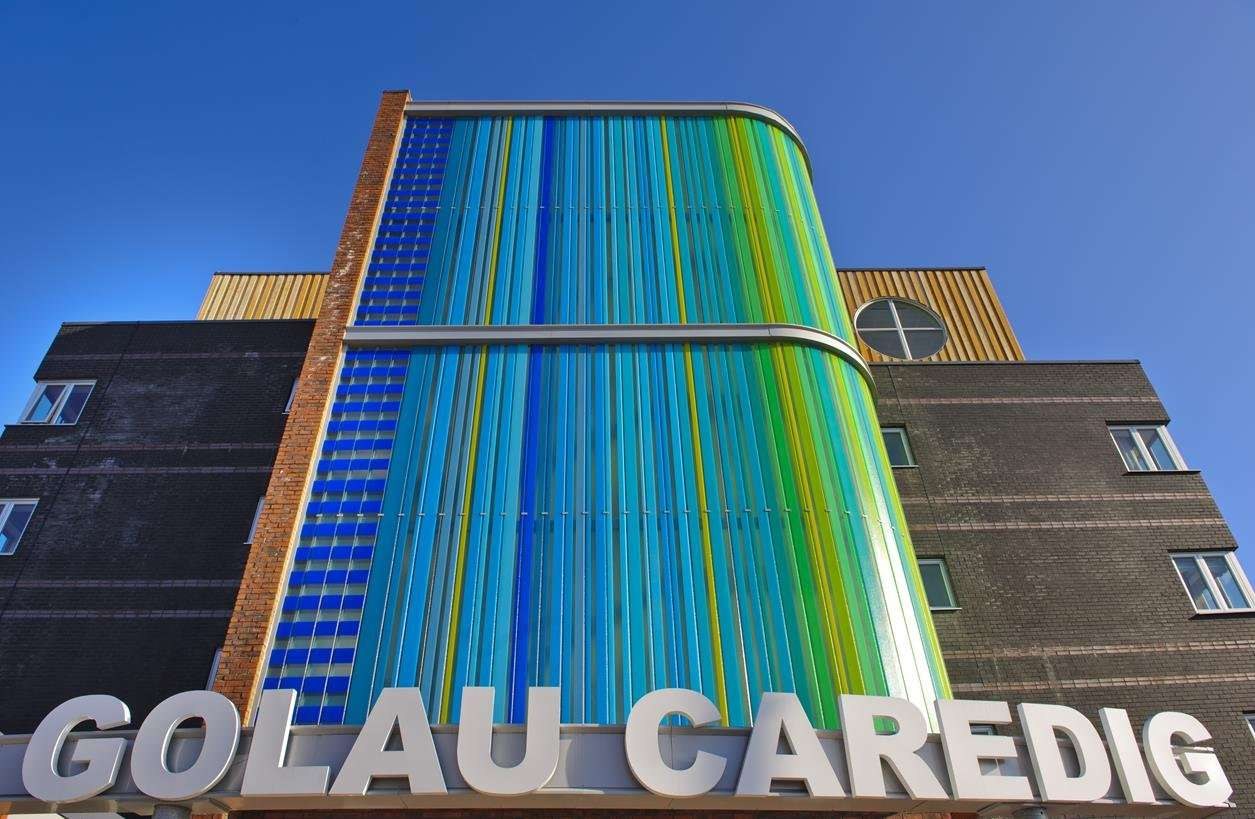 The colourful glass façade of the Golau Caredig building in Barry